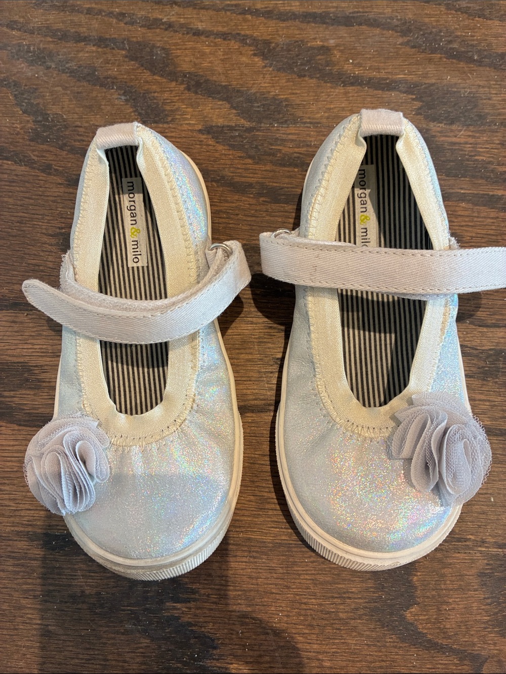 Morgan & Milo Iridescent White Girls' Mary Jane Shoes with Flower Accent